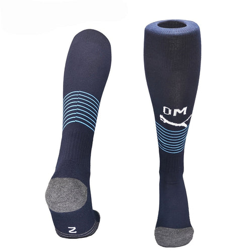 Chaussettes Marseille Extérieur de Le 12 -ème Maillot, design sportif avec logo de l'équipe de football Marseille.