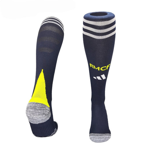 Chaussettes de football Real Madrid Extérieur, marque Le 12 -ème Maillot, avec logo du club et couleurs blanches et bleues.