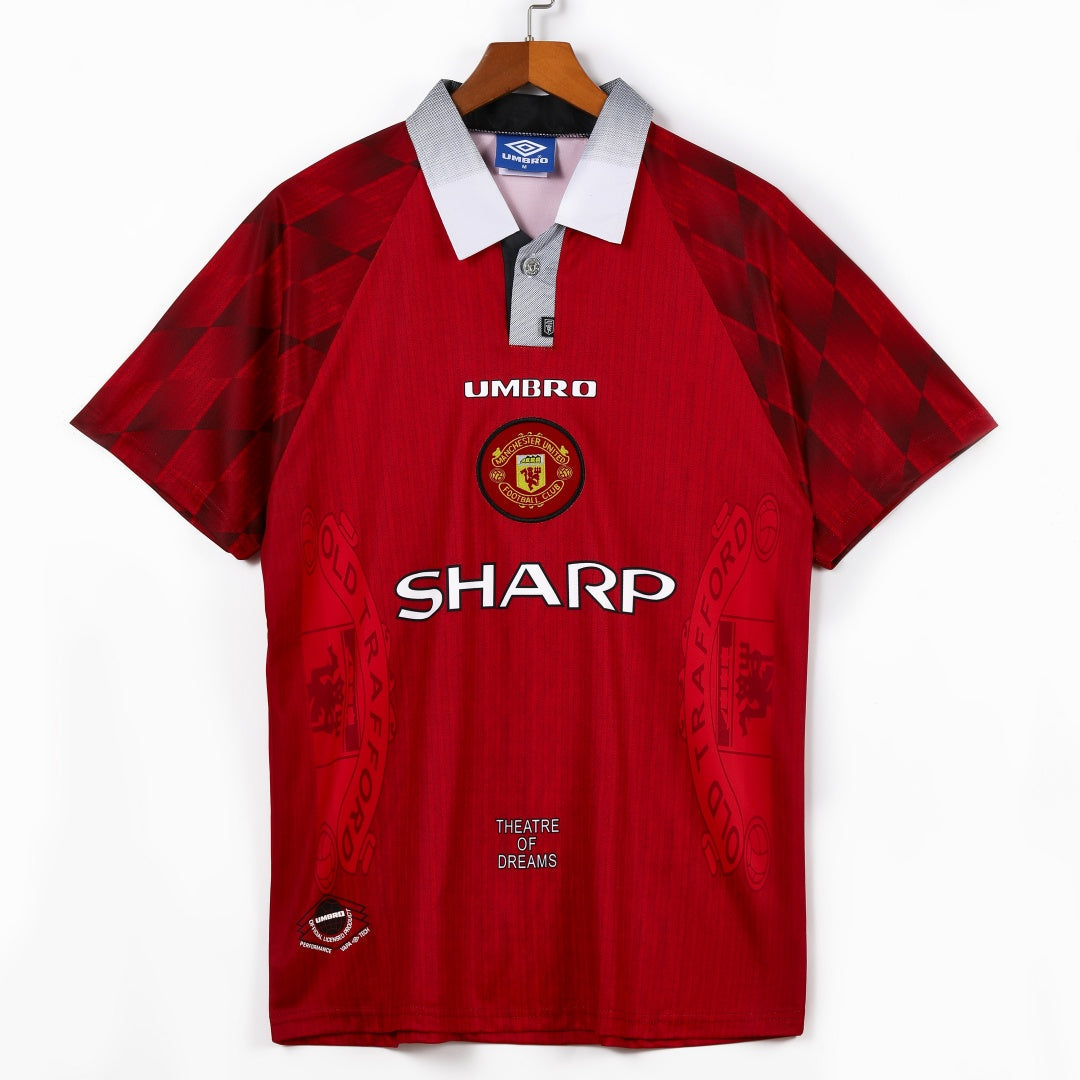 Maillot domicile rétro Manchester United 1996-1997, marque Le 12, maillot de football vintage en image.