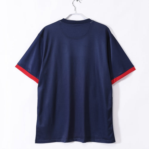 Maillot domicile rétro PSG 2013-2014 de la marque Le 12 -ème Maillot, devant avec logo et design classique.