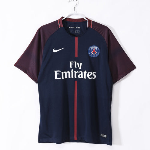 Maillot domicile rétro du PSG 2017-2018, fabriqué par Le 12 -ème Maillot, avec logo et détails du club.