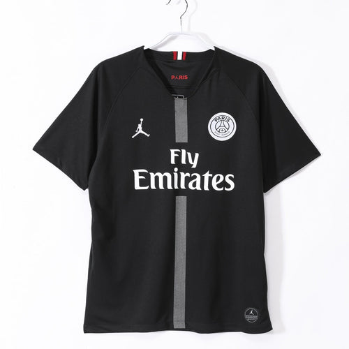 Maillot domicile rétro PSG 2018-2019 Le 12 -ème Maillot, maillot de football bleu avec logo du PSG visible.