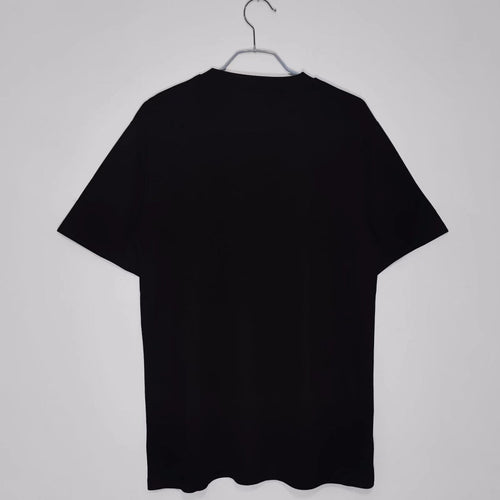 Maillot PSG rétro 2020 Le 12-ème Maillot, noir, manches longues, logo du club visible, design vintage.