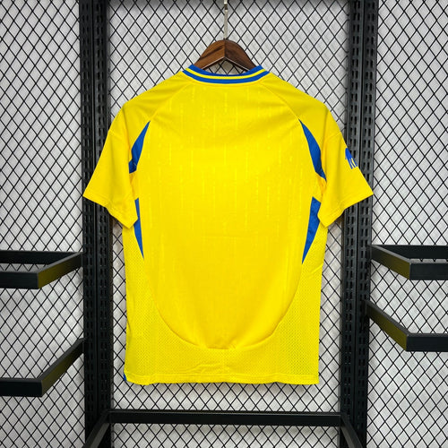 Maillot domicile AL-NASSR 24/25 Le 12 -ème, maillot de football avec logo et détails de l'équipe saoudienne.