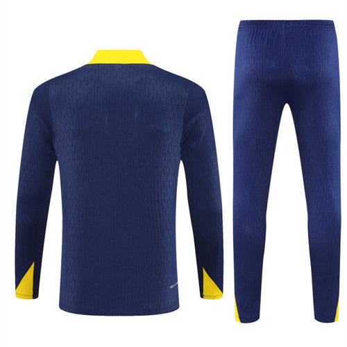 Ensemble Atlético Madrid Le 12 -ème Maillot, taille 25/26, en tissu bleu et blanc avec logo du club visible.