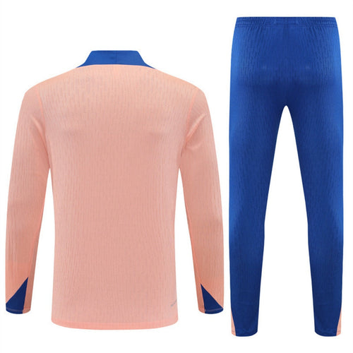 Ensemble 25/26 ans France rose de la marque Le 12 -ème Maillot, maillot de sport rose avec logo France.