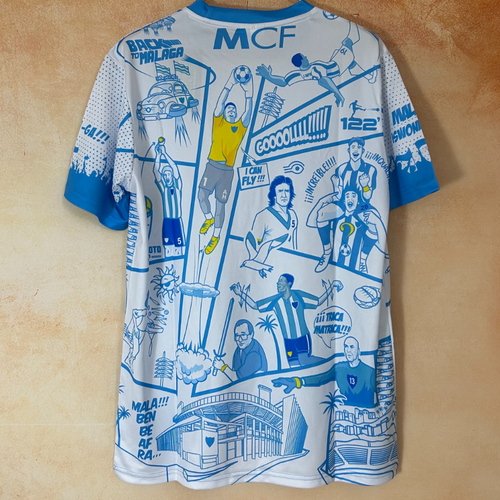 Maillot Malaga spécial Le 12 -ème Maillot, taille 25/26, en tissu coloré avec logo et détails sportifs visibles.