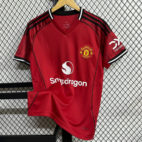 Maillot domicile Manchester United Le 12 -ème Maillot, maillot de football bleu avec logo et détails officiels.