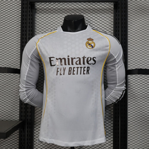 Maillot domicile Real Madrid 25/26 à manches longues, marque Le 12 -ème Maillot, vue de face avec logo et détails du maillot.