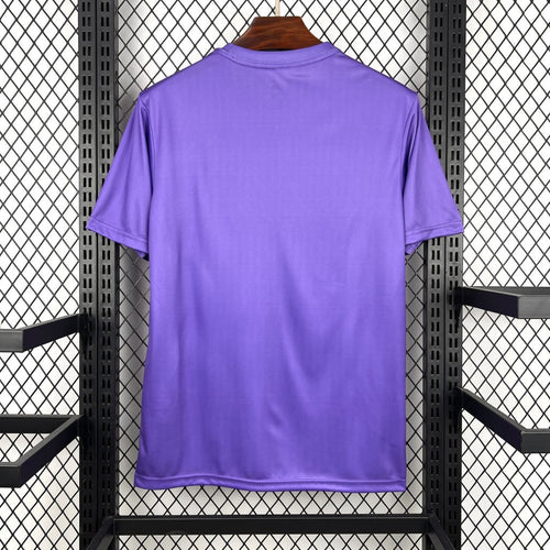 Maillot de football violet Real Madrid 25/26, marque Le 12 -ème Maillot, vue de face avec logo et détails du maillot.