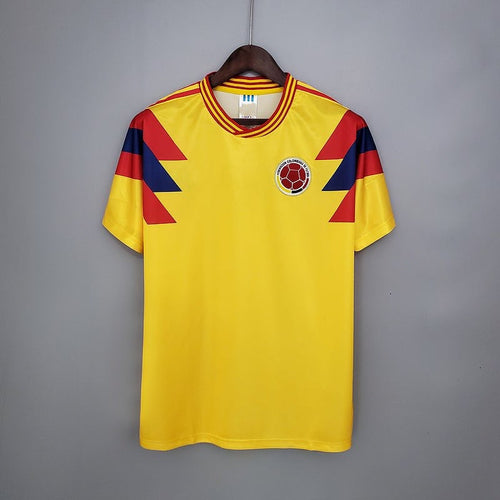 Maillot domicile rétro de la Colombie 1990, marque Le 12-ème Maillot, vue de face avec logo et détails du design vintage.