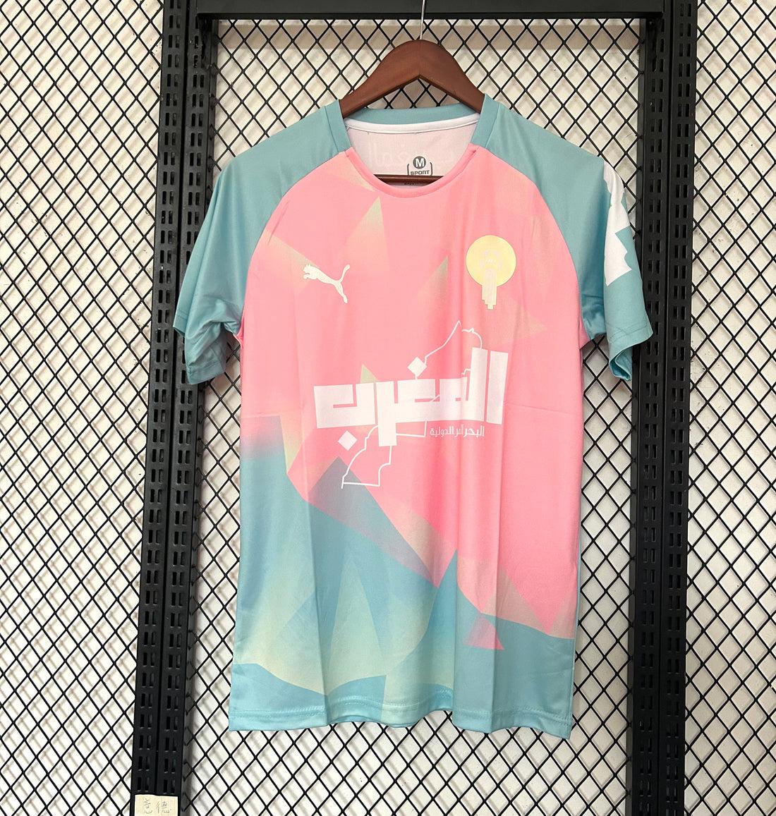 Maillot de football pour enfants Maroc 25/26, turquoise, par Le 12 -ème Maillot, affiché sur un mannequin.