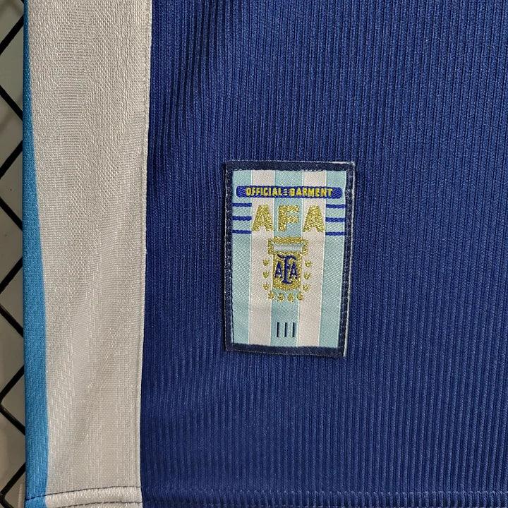Maillot Argentine rétro 1998 de Le 12 -ème Maillot, maillot de football avec le logo de l'équipe nationale Argentine.