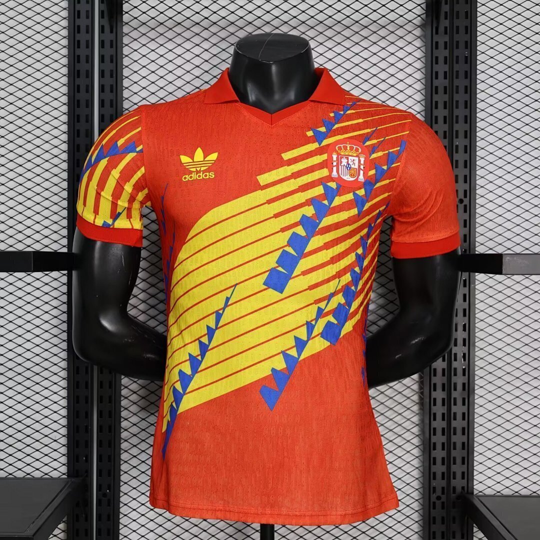 Maillot Espagne Concept 2026 de Le 12 -ème Maillot, devant avec design moderne et couleurs rouges et jaunes.