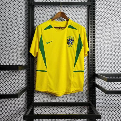 Maillot de football Brésil rétro 2002, marque Le 12 -ème Maillot, détails du design vintage et logo officiel.