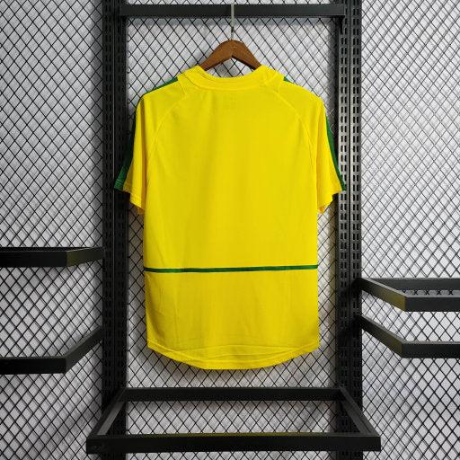 Maillot de football rétro Brésil 2002 Le 12-ème Maillot, maillot de foot brésilien avec logo et design vintage.