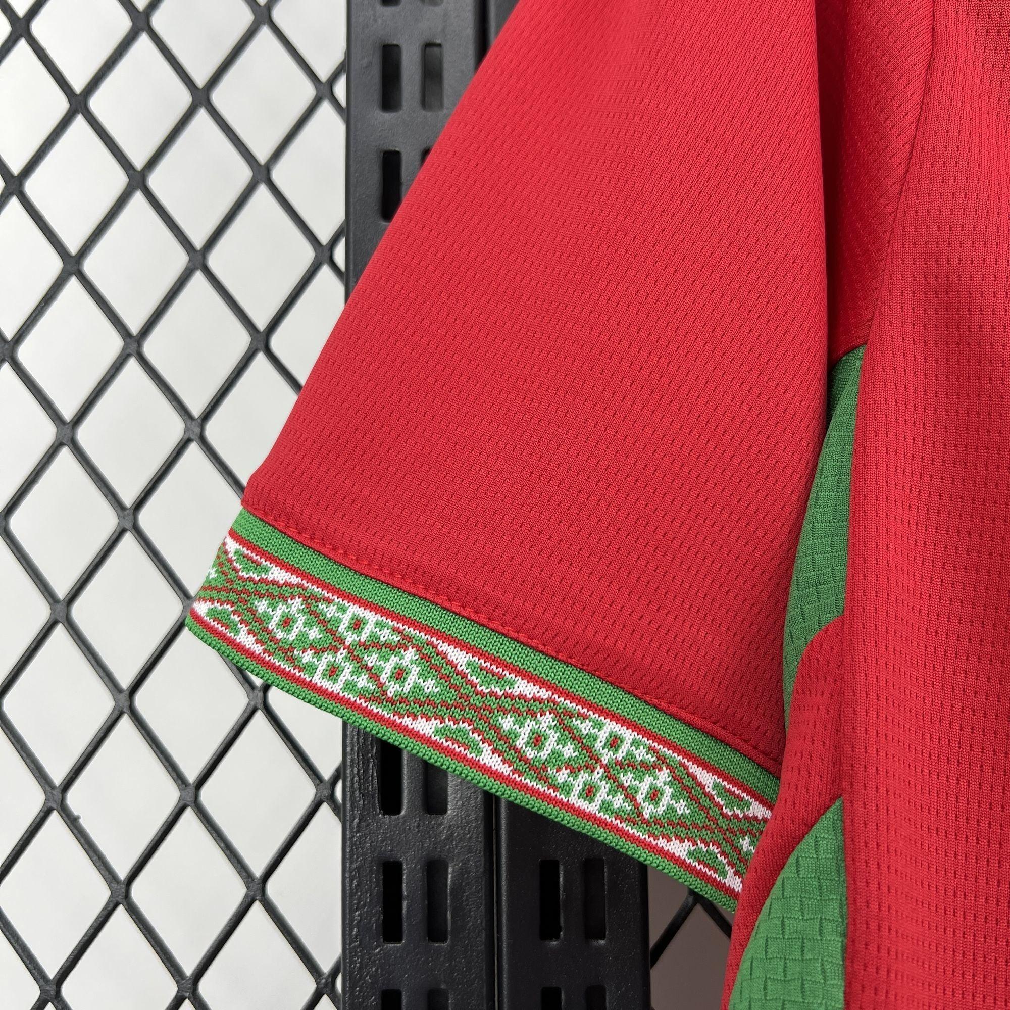 Maillot Maroc Coupe du Monde 2026 Le 12 -ème Maillot, maillot de football vert avec logo national et détails de l'équipe.