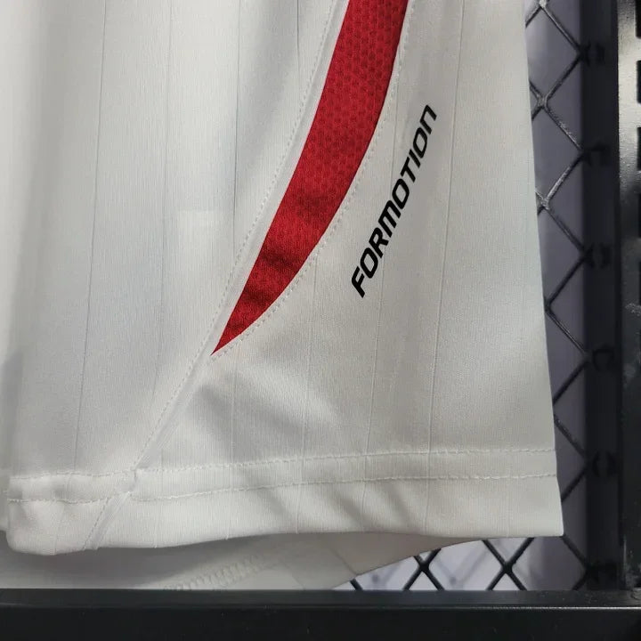 Maillot rétro de l'équipe de France 2006 Le 12 -ème Maillot, maillot de football avec le logo et les couleurs françaises.